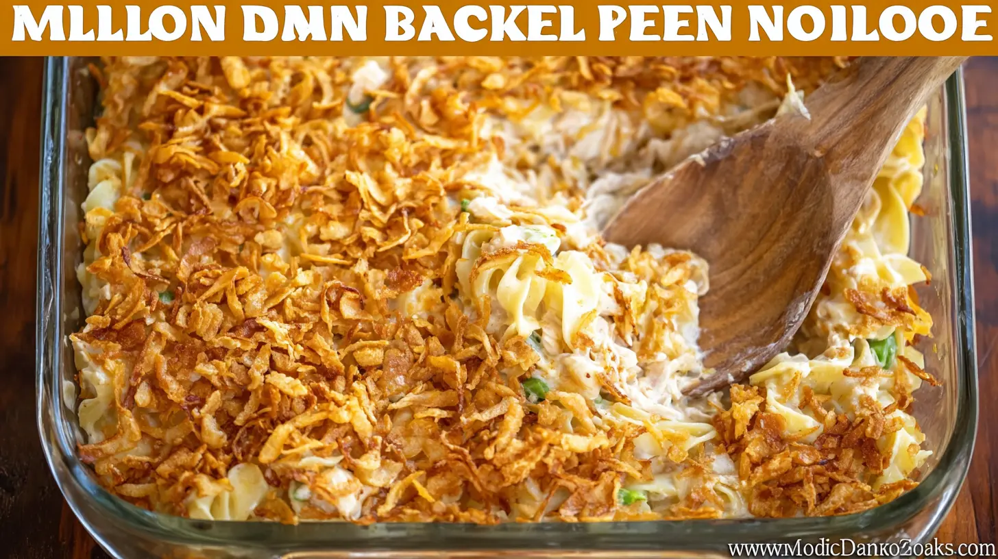 Million Dollar Chicken Noodle Casserole - Plain Chicken, topped with crispy fried onions in a glass baking dish.